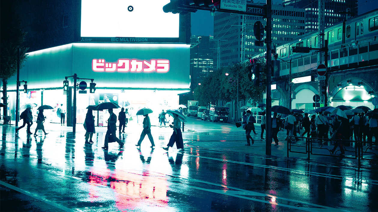 Green effect image of people walking on the street in rainy day